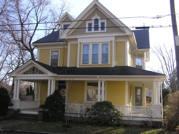 Free Classic house with classical columns and symmetrical porch details