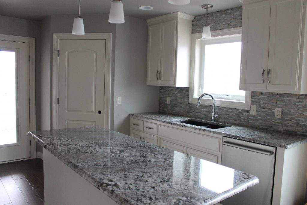 Grey Granite with White Cabinets