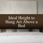 how high to hang a picture over a bed